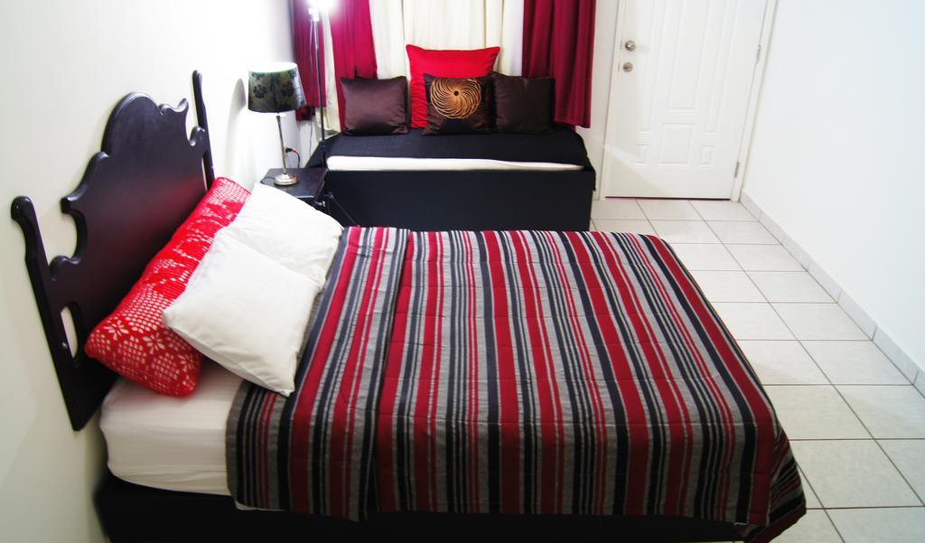 Uw Oasis Hotel La Ceiba Zimmer foto